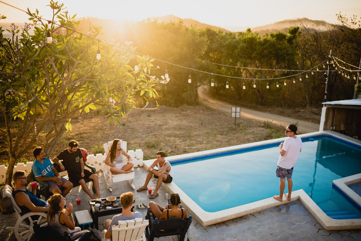 people gathered at a party celebrating with CBD